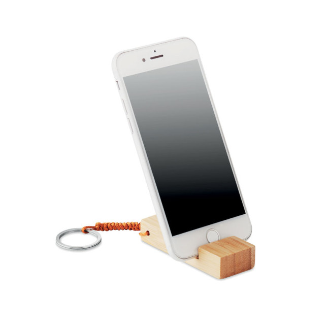 Brelok i podstawka na smartfon TRINEU